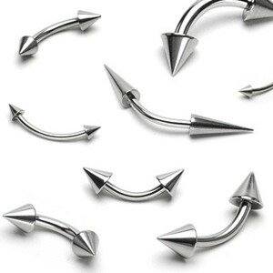 Piercing do obočia z ocele - dva lesklé špicaté hroty - Rozmer: 1,6 mm x 10 mm x 4x4 mm